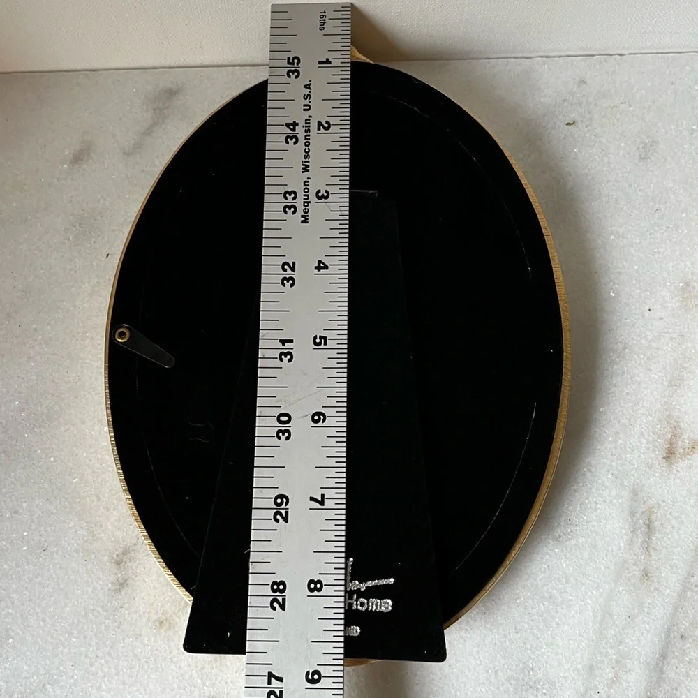 Nicole Miller elegant oval
